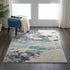 2' X 4' Ivory And Teal Blue Abstract Power Loom Non Skid Area Rug